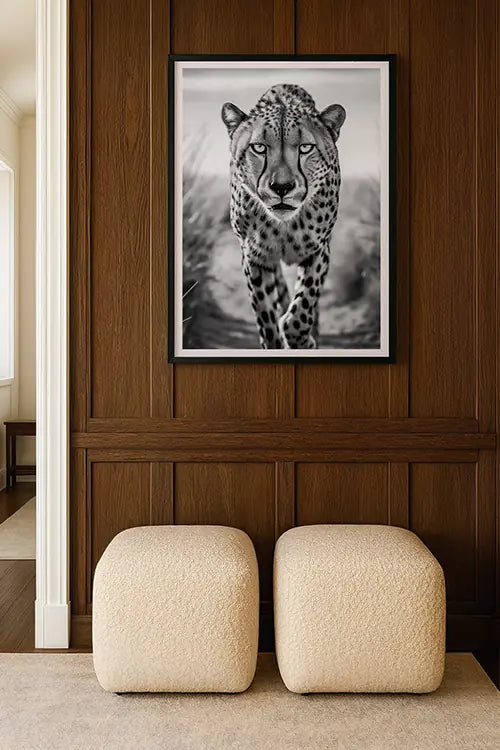 Black and white cheetah fine-art print styled on walnut wall, part of the Wildlife Art Prints collection by Blanc Studio