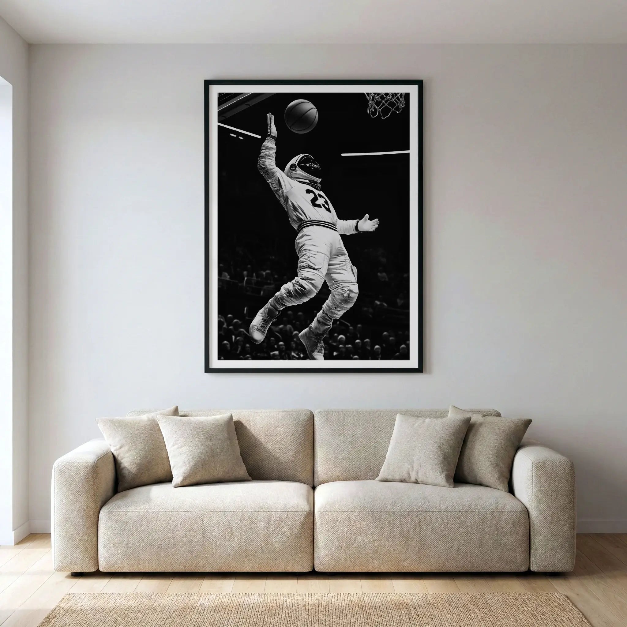 Framed surreal sports art print with astronaut dunking a basketball, titled Twenty Three displayed in living room