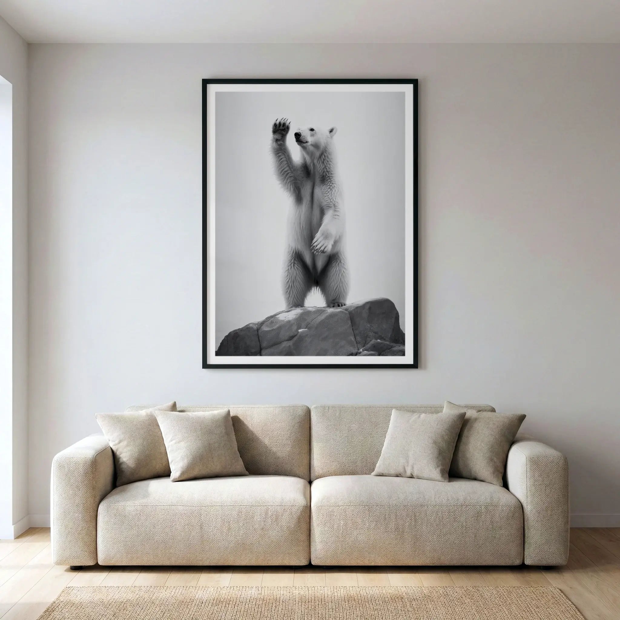 Framed black and white art print with polar bear standing on hind legs on a rock, titled 90 Degrees North displayed in living room