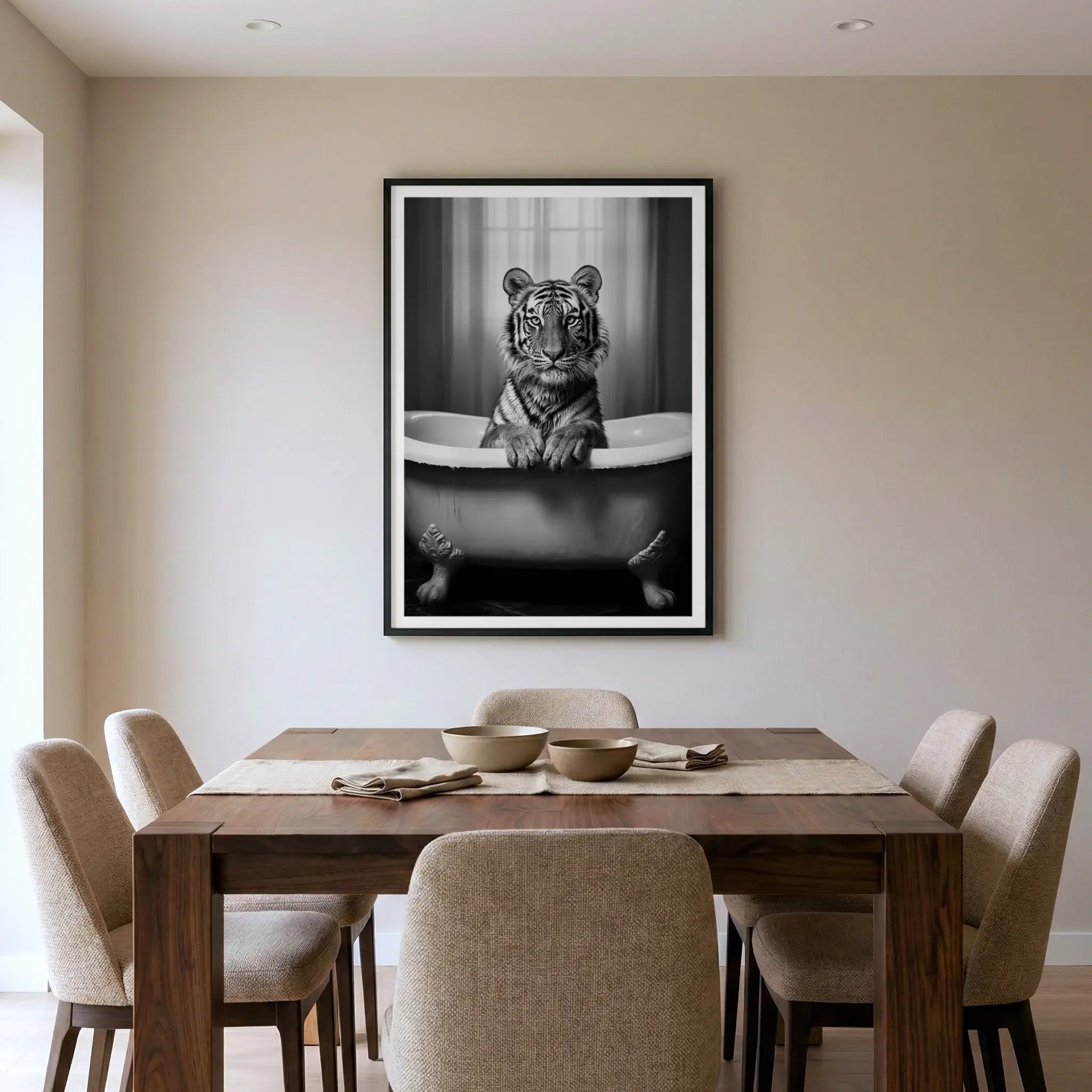 Framed black and white art print with tiger sitting in a bathtub, titled Bathtime displayed in living room