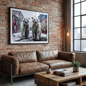 Artwork of two polar bears sprayed in graffiti displayed on an exposed brick wall in a loft living space.