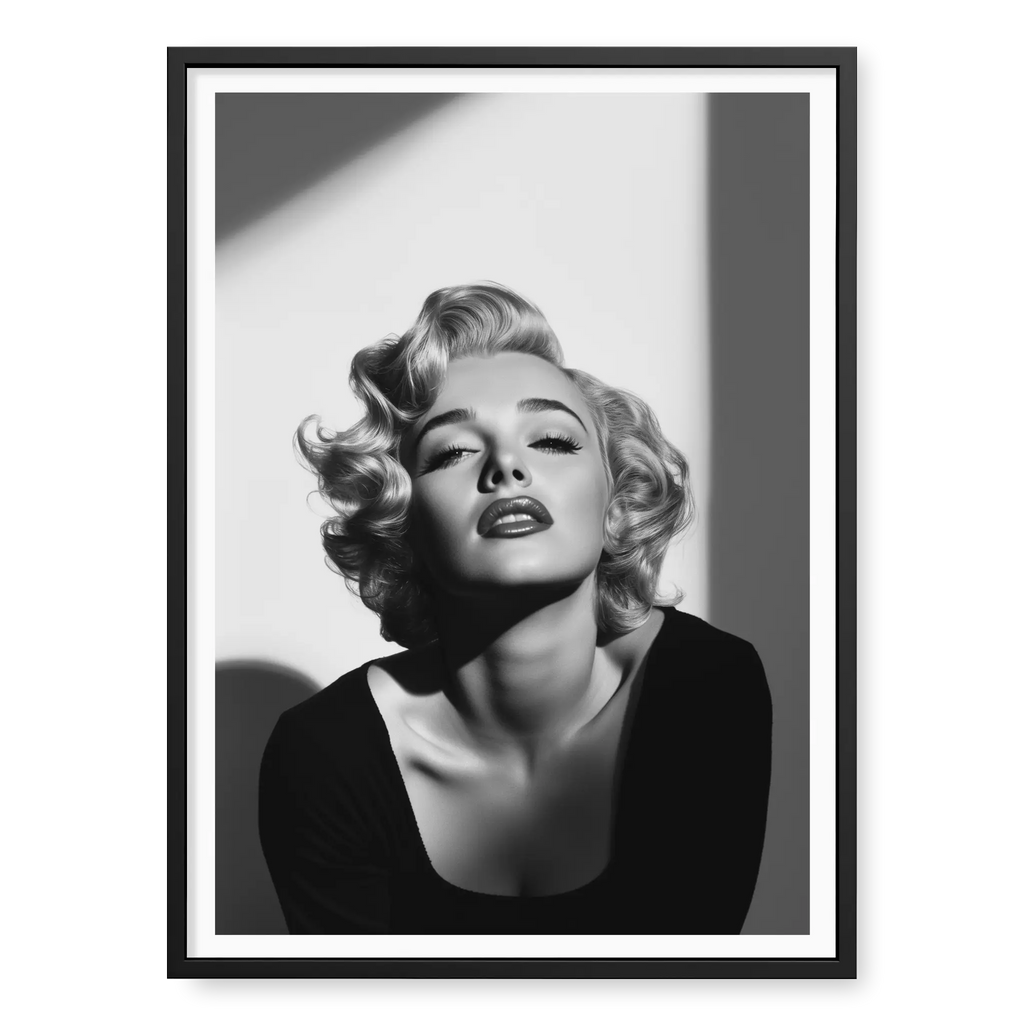 Close-up of Marilyn Monroe with short curly hair and dark lipstick looking up into light, black and white art print titled Blonde Bombshell in black frame