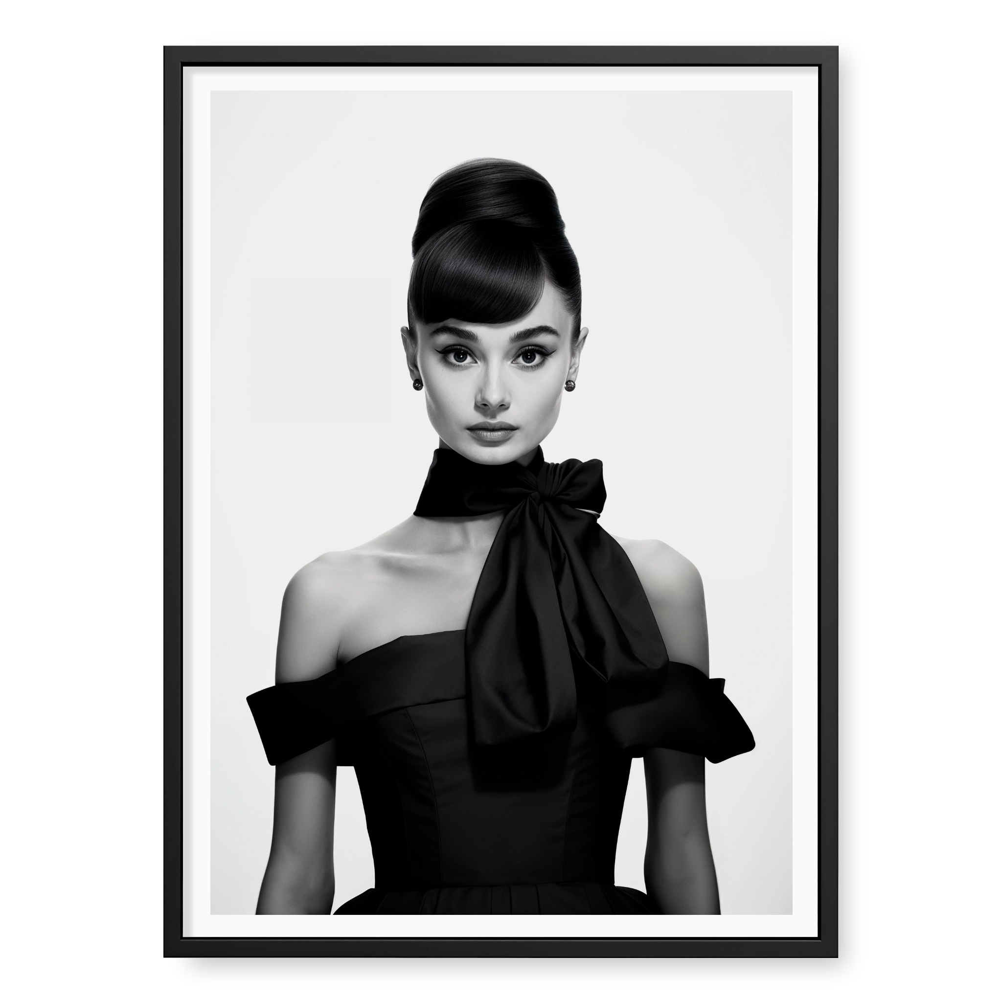 Portrait of Audrey Hepburn with high bun and black bow dress, black and white art print titled Breakfast at Tiffany's in black frame