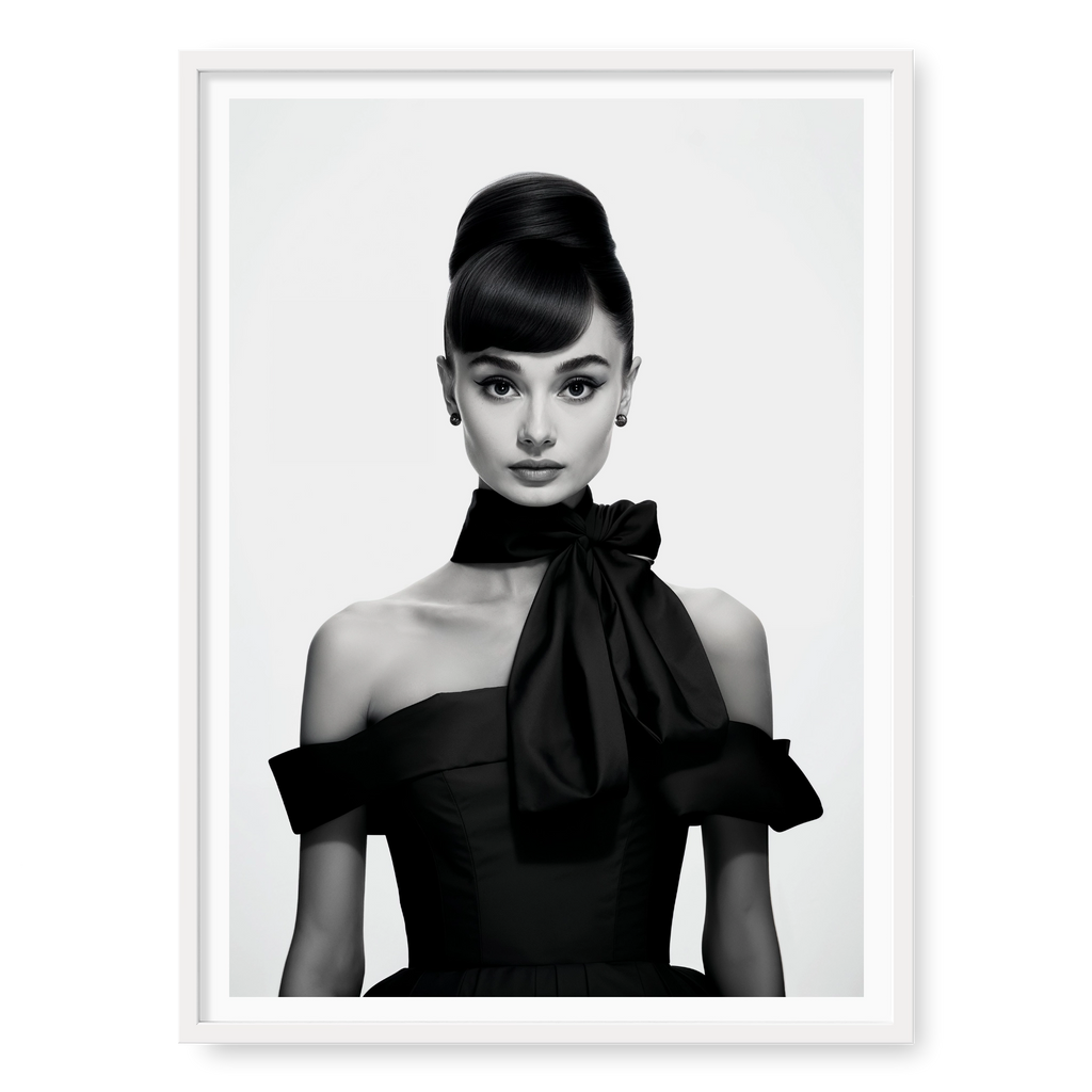 Portrait of Audrey Hepburn with high bun and black bow dress, black and white art print titled Breakfast at Tiffany's in white frame