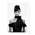 Portrait of Audrey Hepburn with high bun and black bow dress, black and white art print titled Breakfast at Tiffany's