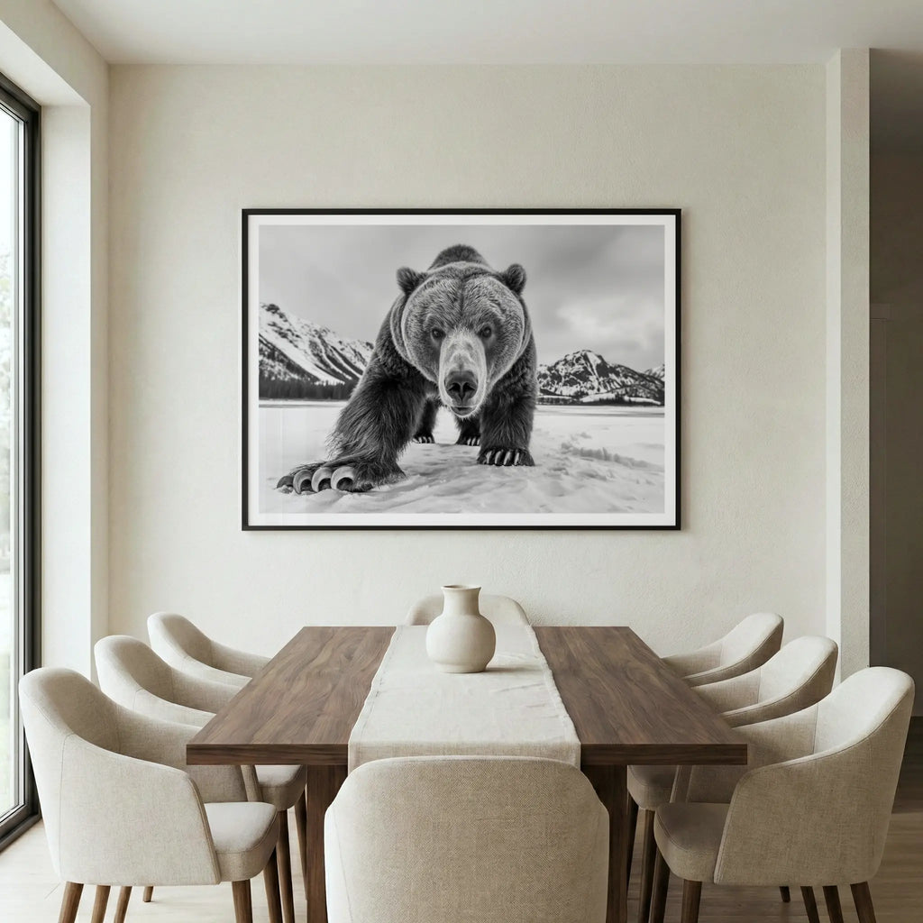 Framed black and white art print with grizzly bear approaching on snow, titled Curiosity displayed in dining room