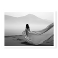 Rear view of woman in a long flowing dress walking across sand dunes towards misty mountains, black and white art print titled Freedom