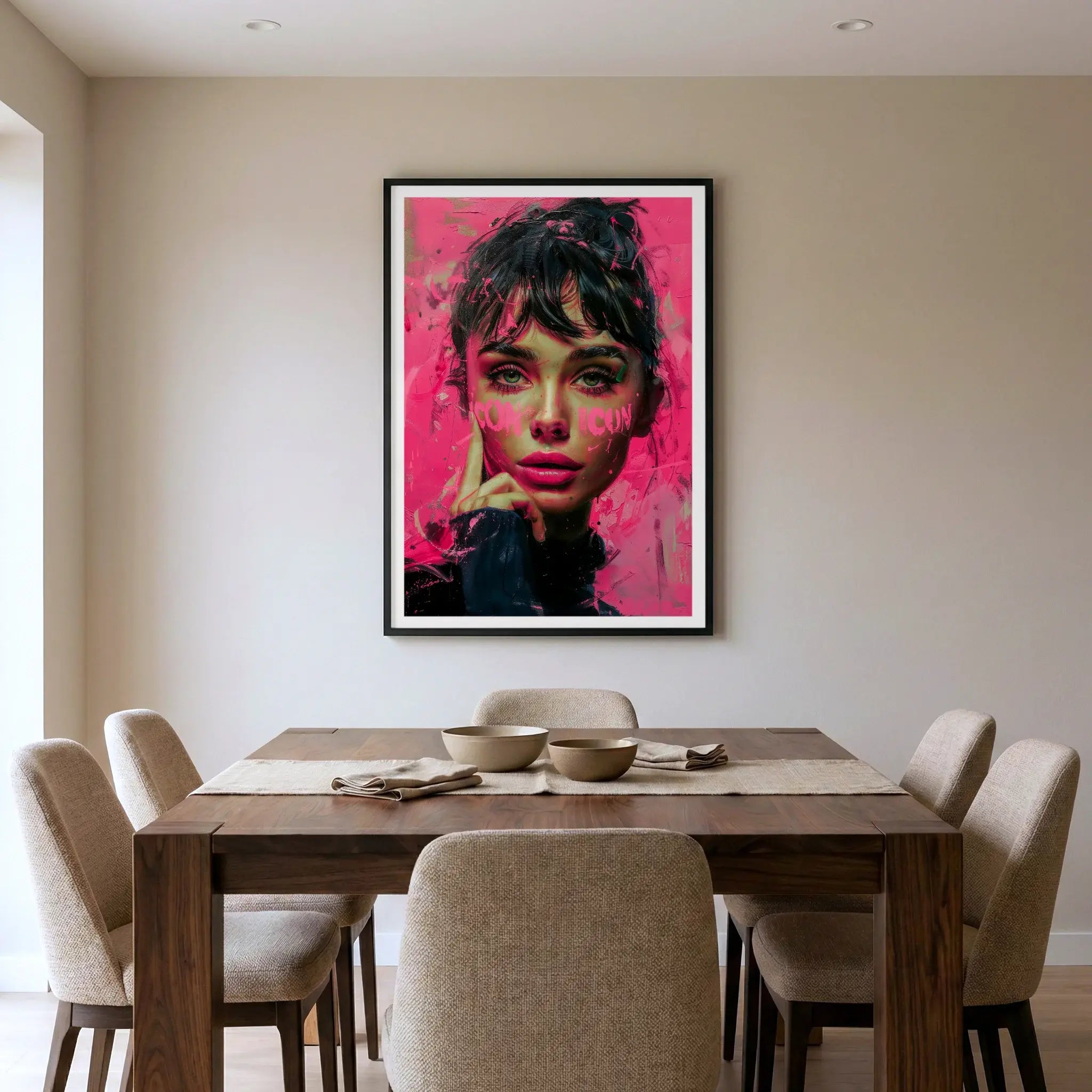 Framed pink pop art print of Audrey Hepburn, titled Icon displayed in living room