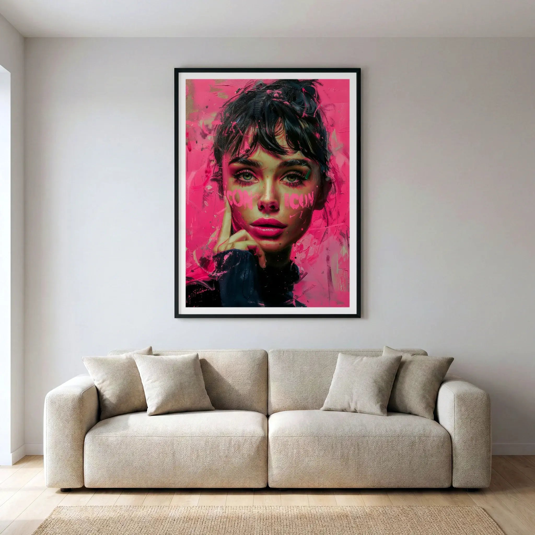 Framed pink pop art print of Audrey Hepburn, titled Icon displayed in dining room