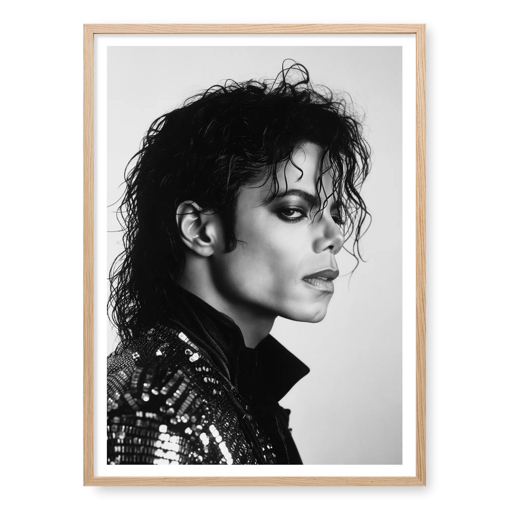 Side profile portrait of Michael Jackson looking to the right wearing a sequinned jacket, black and white art print titled King of Pop in natural oak frame