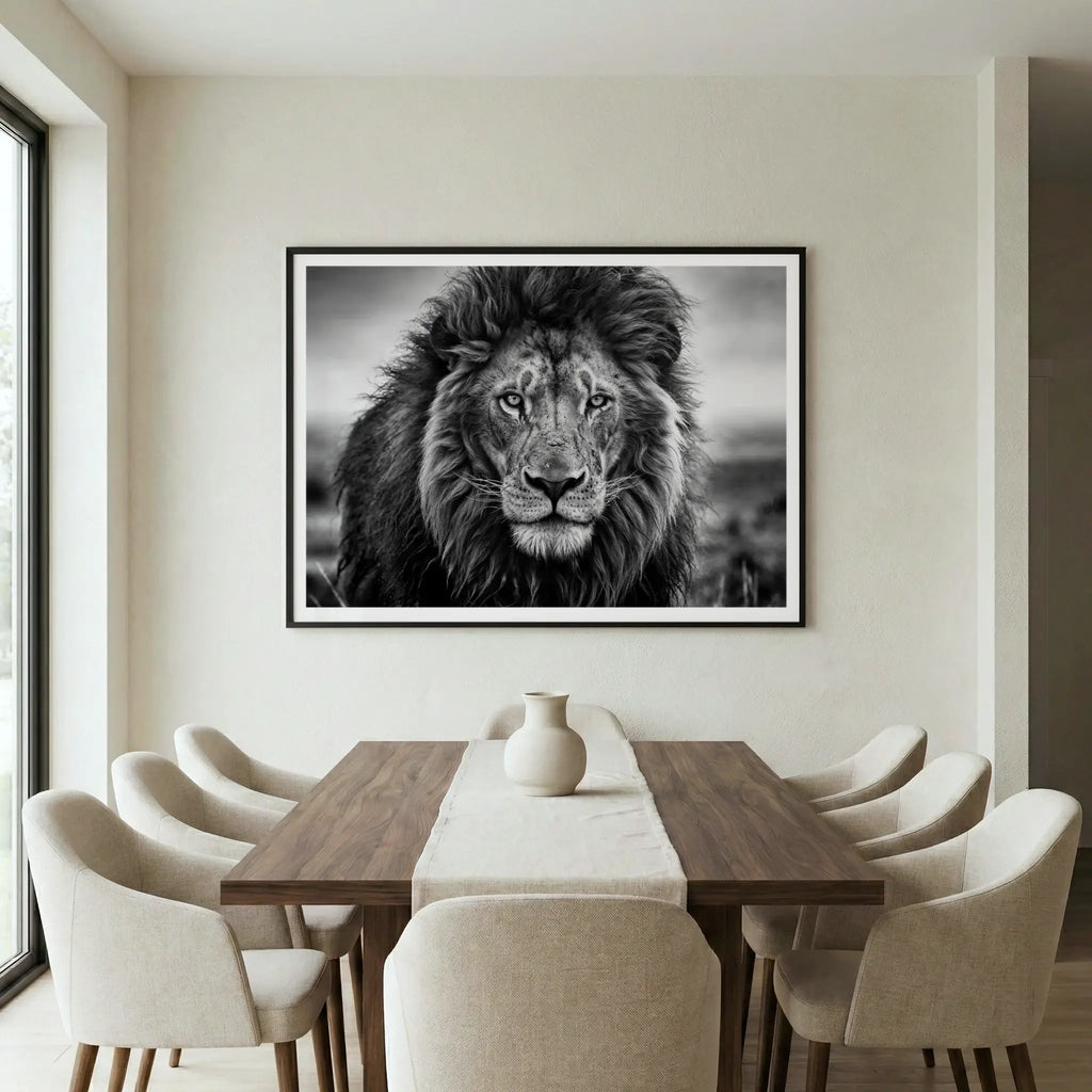 Framed black and white lion portrait with intense gaze, titled Leo displayed in dining room
