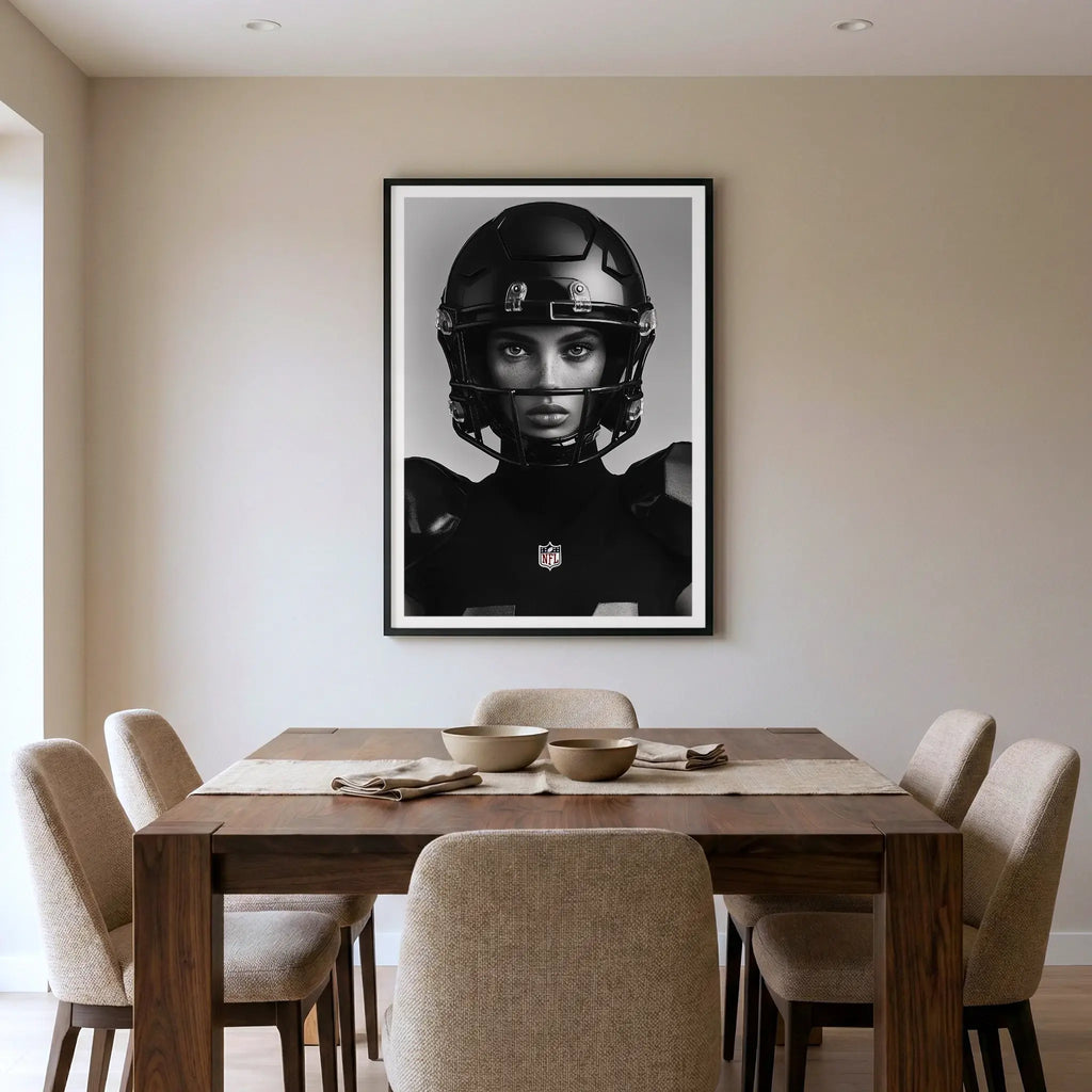 Framed black and white sports art print with female football player, titled Modern Gladiator displayed in dining room