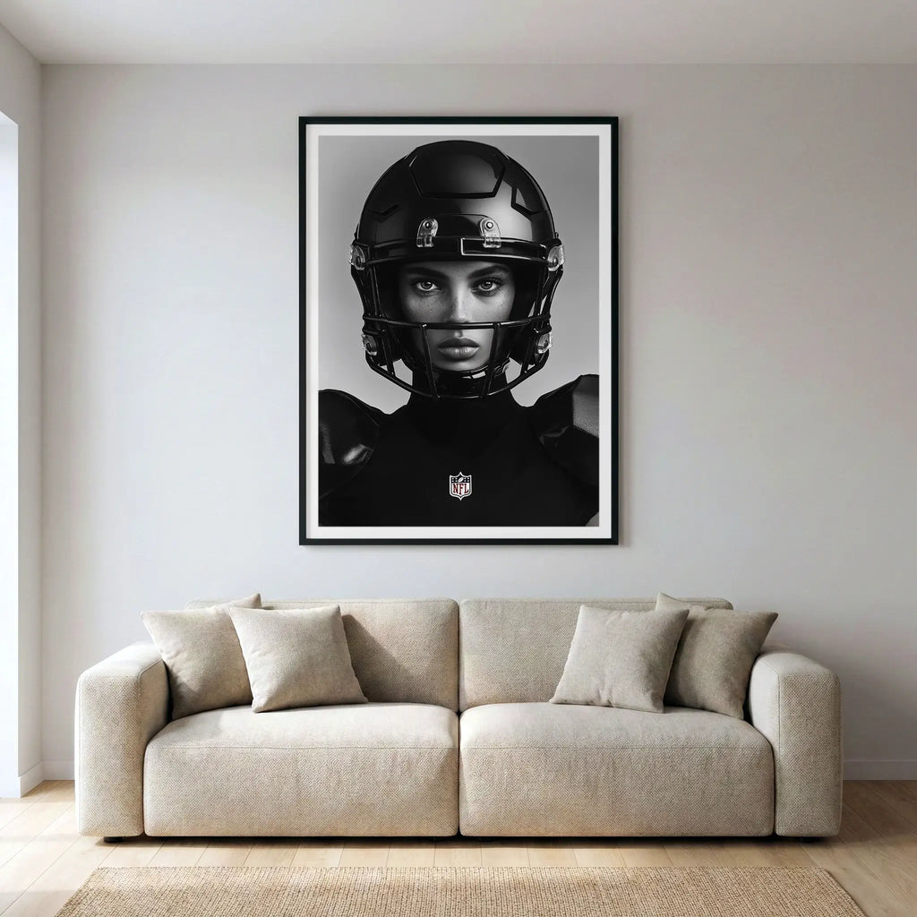 Framed black and white sports art print with female football player, titled Modern Gladiator displayed in living room
