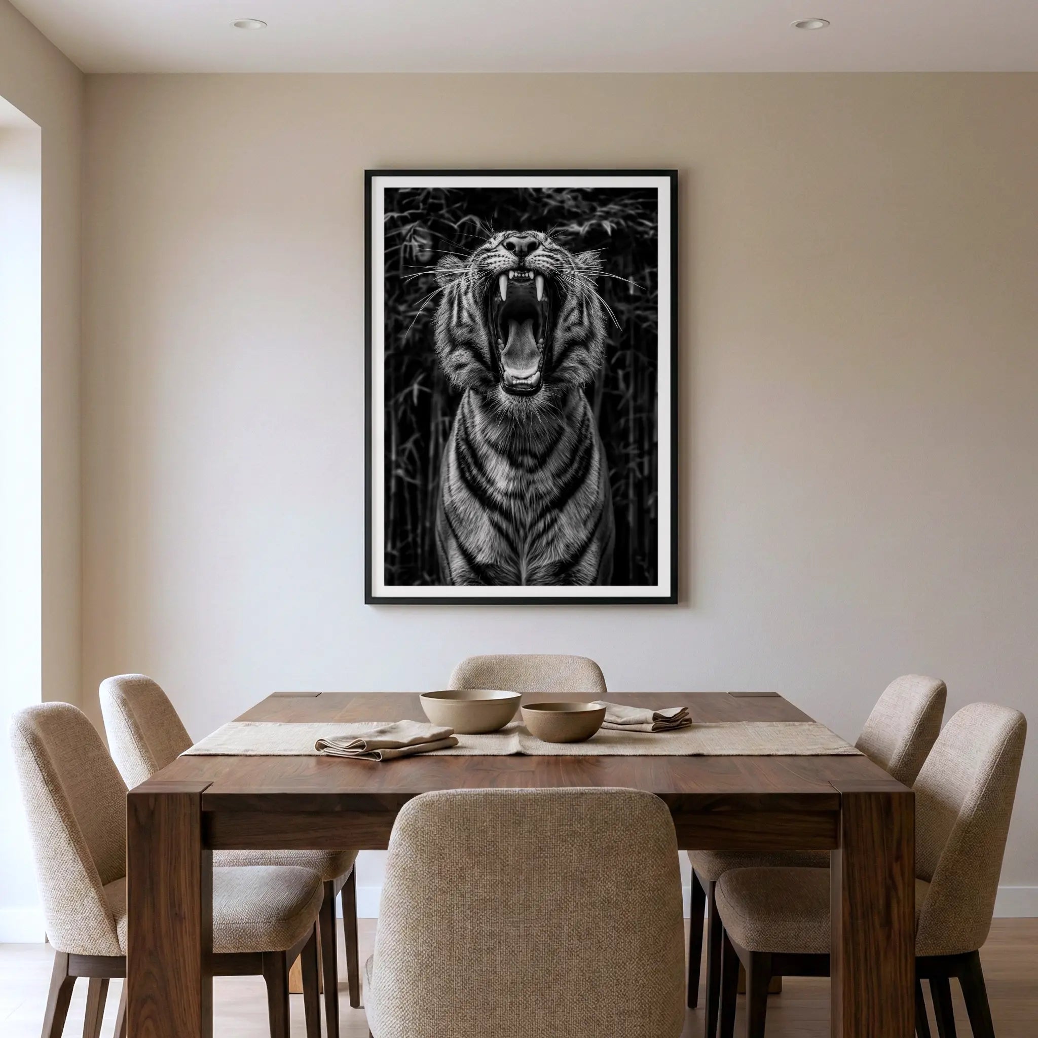 Framed black and white art print with roaring tiger, titled Rawr displayed in dining room