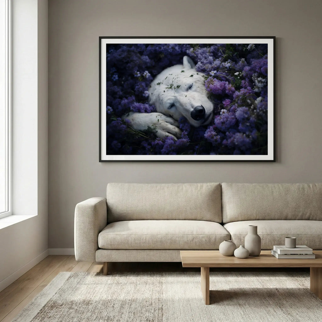 Framed wildlife art print with sleeping polar bear and purple flowers, titled Royalty displayed in living room