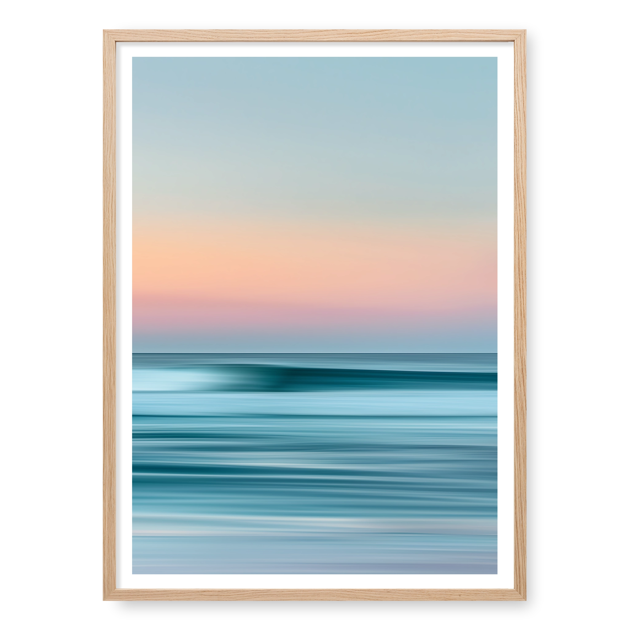 Abstract long-exposure seascape with blurred horizontal lines of teal water and pink sunset sky, art print titled Utopia in natural oak frame
