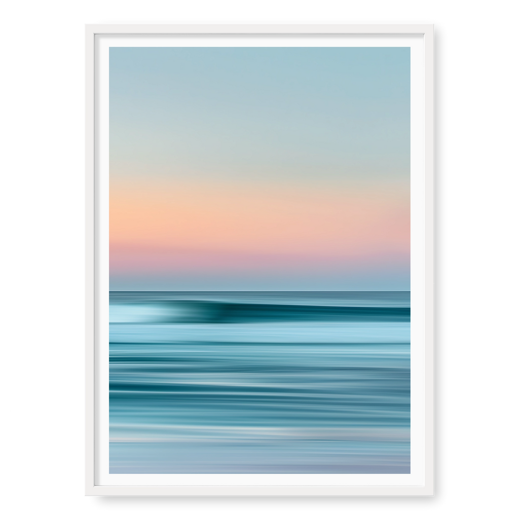 Abstract long-exposure seascape with blurred horizontal lines of teal water and pink sunset sky, art print titled Utopia in white frame